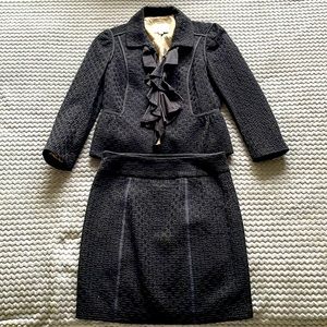 Black jacket and skirt suit combo